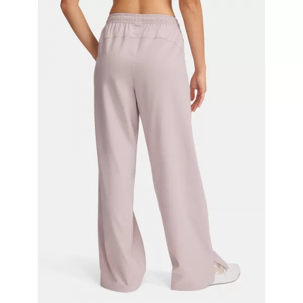  Dámske športové nohavice UNDER ARMOUR RIVAL WIDE LEG PANT 1386453-009 SIVÁ 