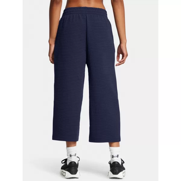  Dámske športové nohavice UNDER ARMOUR UNSTOPPABLE FLC GRID CROP 1386492-410 MODRÁ 