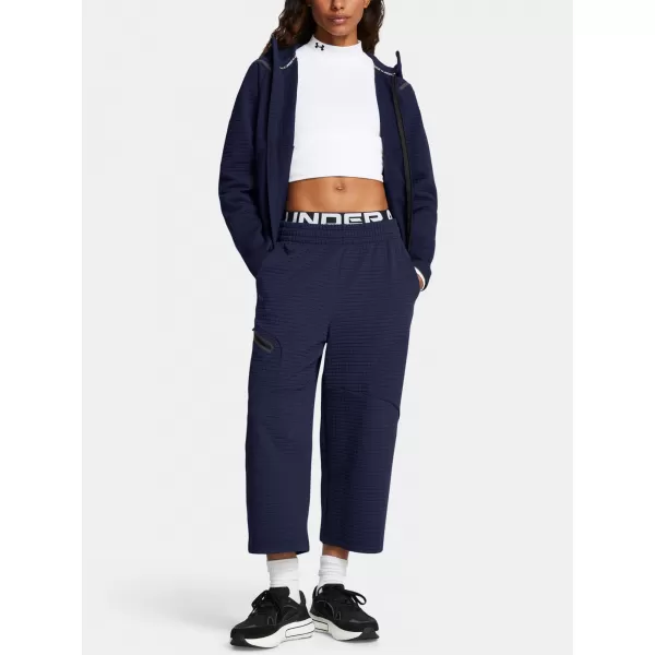  Dámske športové nohavice UNDER ARMOUR UNSTOPPABLE FLC GRID CROP 1386492-410 MODRÁ 