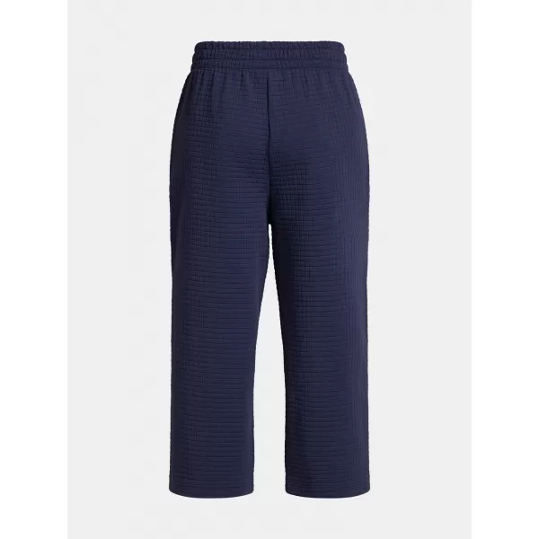  Dámske športové nohavice UNDER ARMOUR UNSTOPPABLE FLC GRID CROP 1386492-410 MODRÁ 
